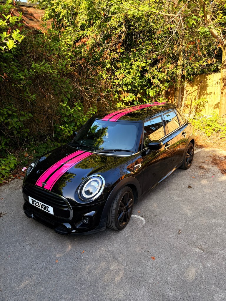 Completed vehicle wrap installation - precision detail work